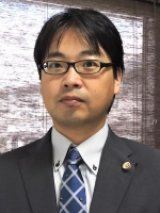 辻上 友男